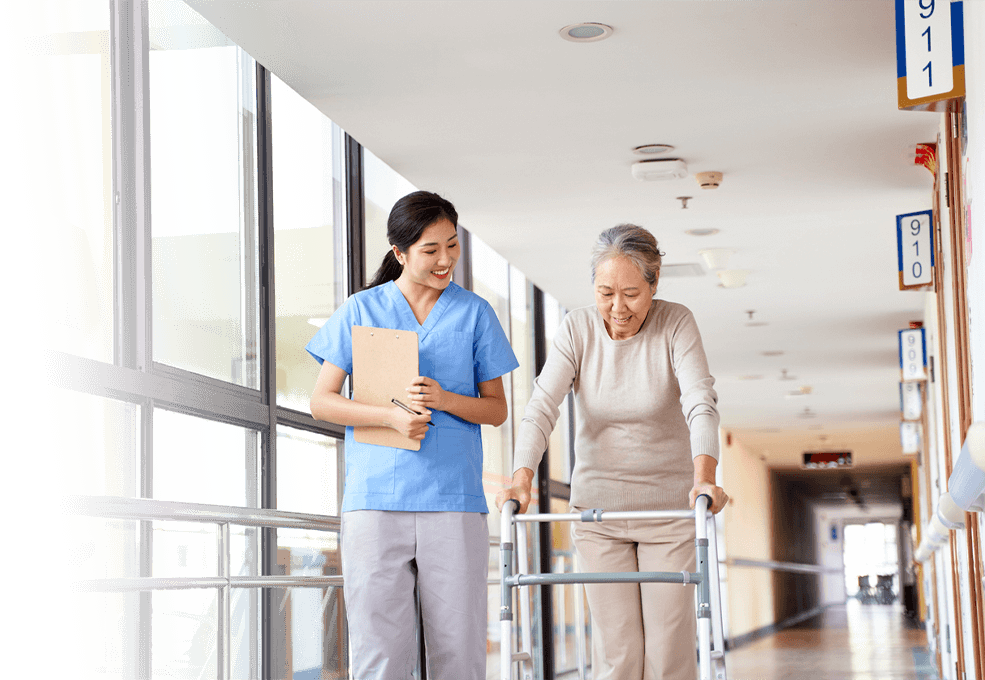 A Nurse walking with senior lady