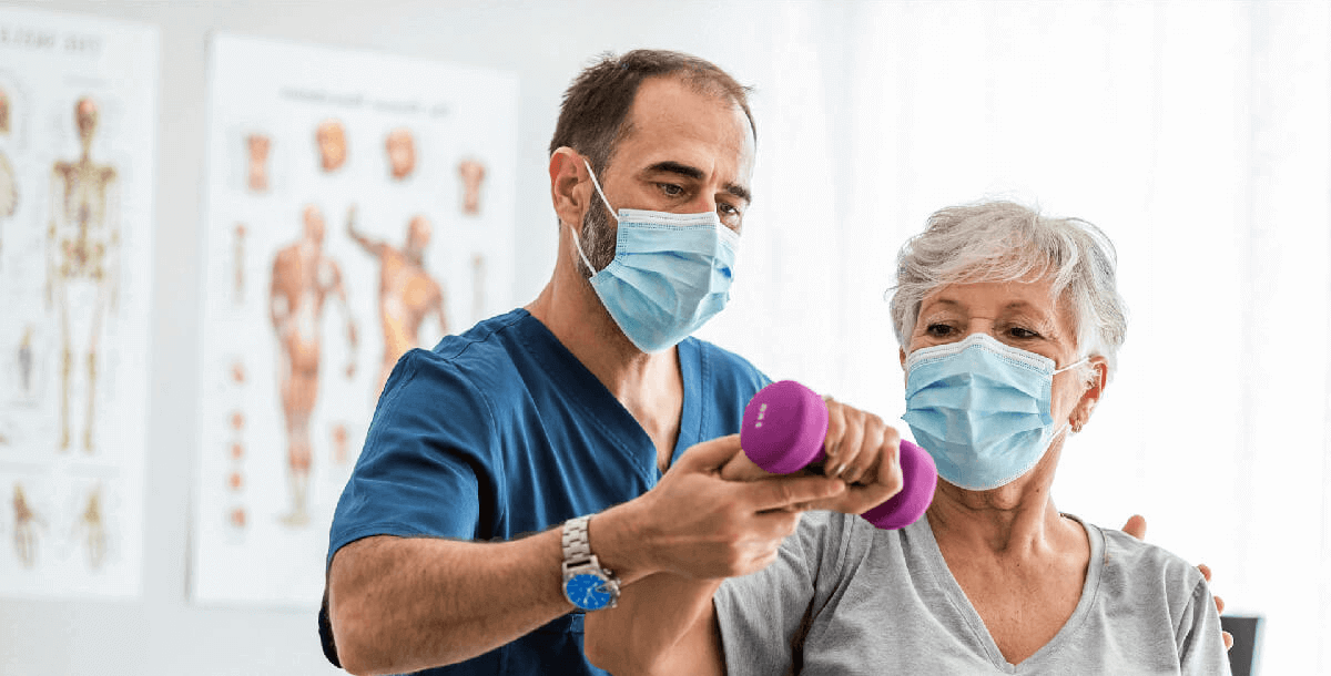 Doctor Helping patient in exercise